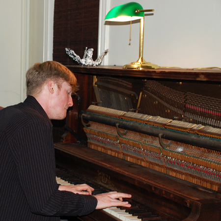 Jon plays the acoustic piano